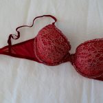 red bra on bed